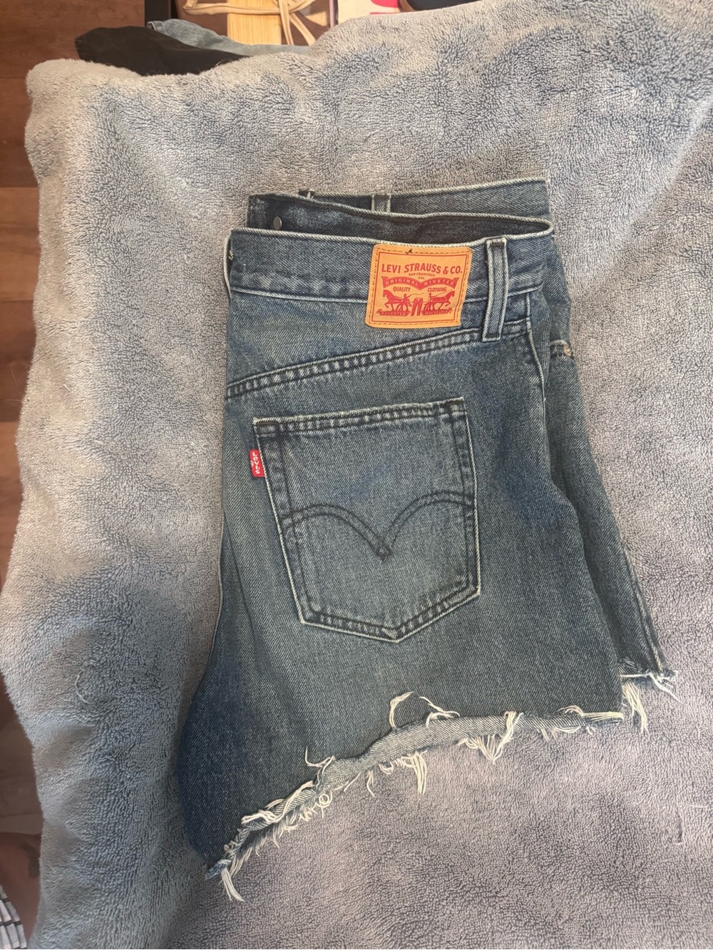 Levi's Dark Blue Frayed Denim Cutoff Shorts